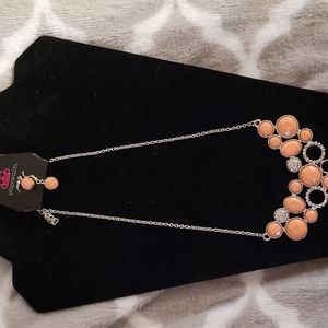 pink necklace with earrings